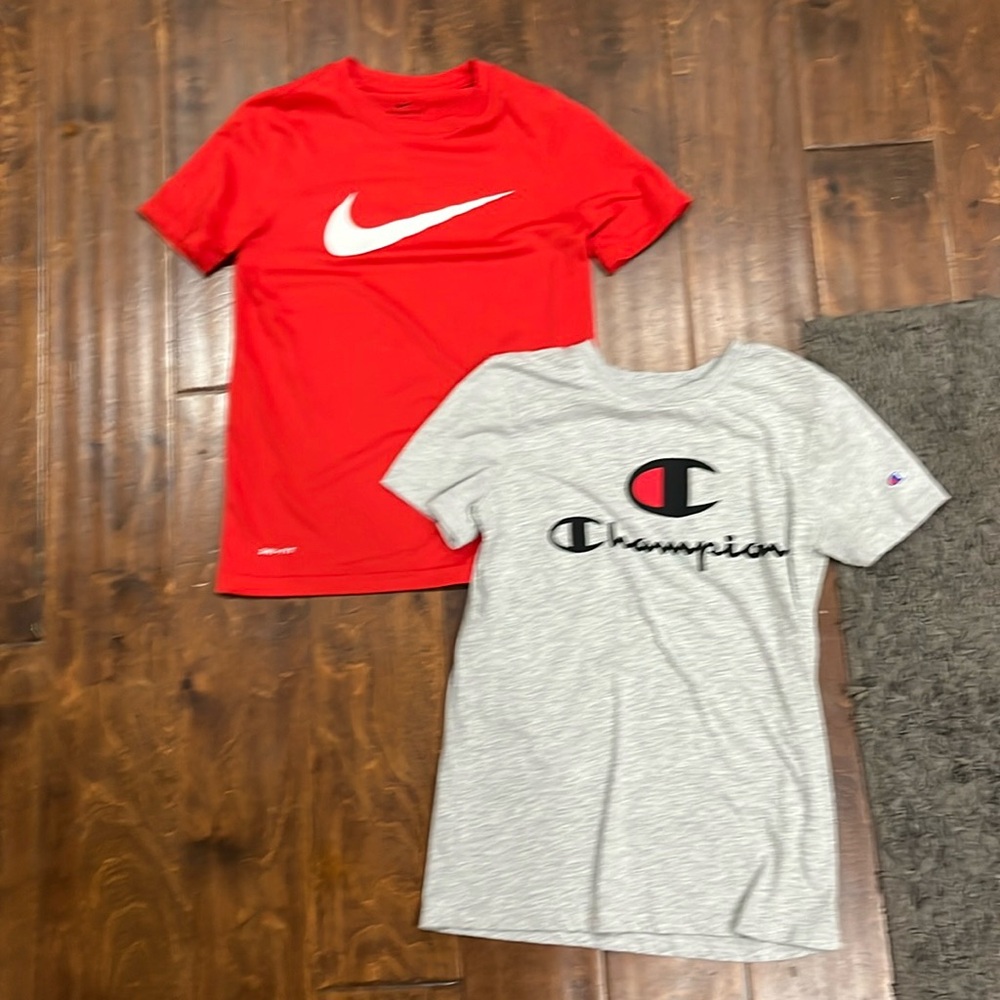 grey champion shirt and red nike shirt